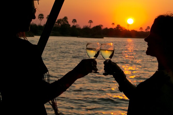 Dinner Cruise on the Zambezi River, Victoria Falls - Heading toward the falls before turning into the sunset