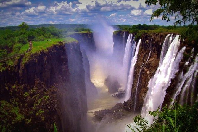 Full Day Victoria Falls incl lunch & Devils Pool 10h ZIMBABWEAN & ZAMBIAN SIDE - Zimbabwe’s Rainforest Gives You the Classic Falls View