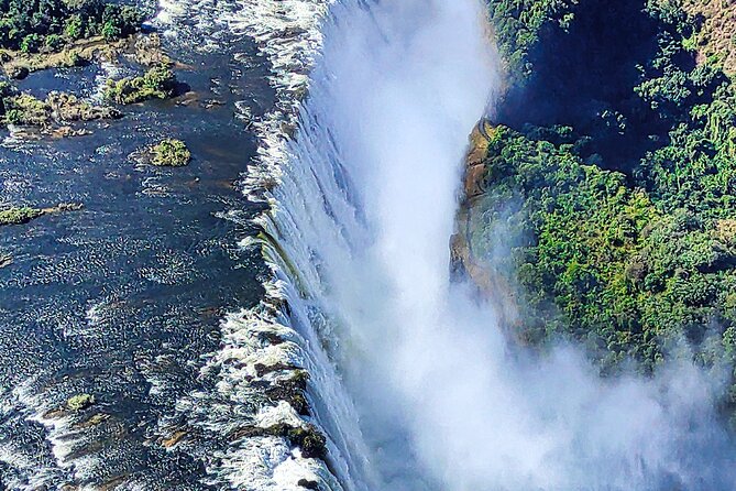 Guided Tour of the Falls (ZIM side) Wildlife Safari, by Savannah - The rainforest created by the spray