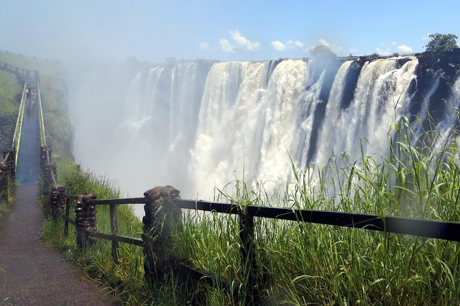 Guided Tour of the Majestic Victoria Falls - Walking into the Smoke That Thunders