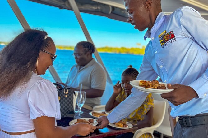 Sunset Cruises on the Zambezi River from Victoria Falls - The Ndebele welcome at the river jetty