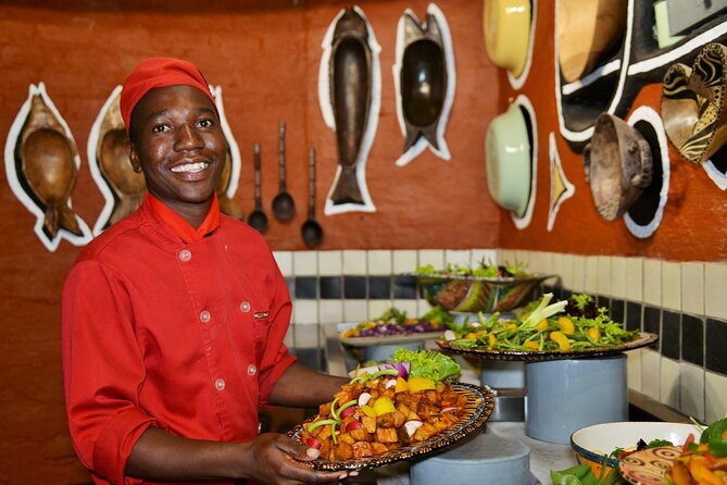 The Boma Dinner, Dance And Drum Show In Victoria Falls - Robes, face painting, and a hand-washing ceremony