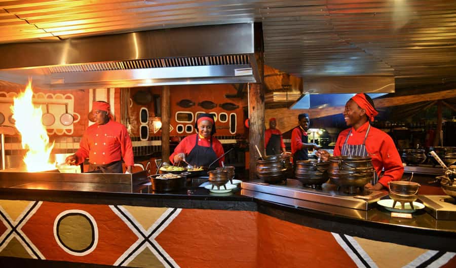 Victoria Falls Full Day Experience - Browsing an African crafts market