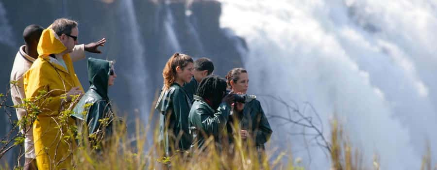 Victoria Falls Guided Tour Plus Lunch & Transport - The Falls in 17 changing views