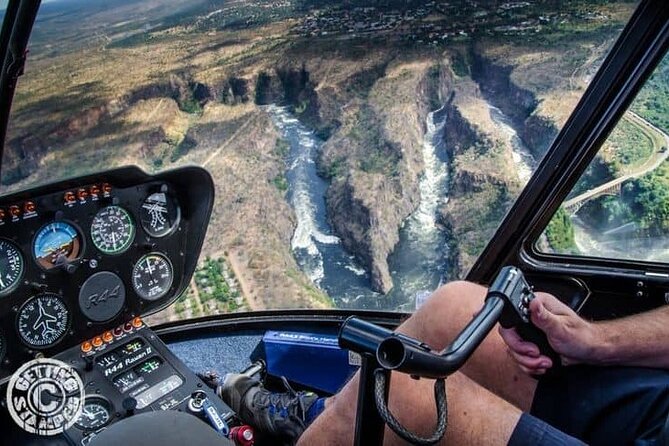 Victoria Falls Helicopter Tour with Guide - Seeing Victoria Falls as a river, gorge, and curtain of spray