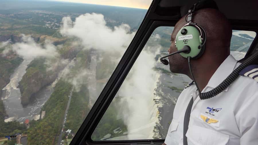 Victoria Falls: Helicopter Tour with Hotel Pickup - Wildlife, river islands, and the return flight