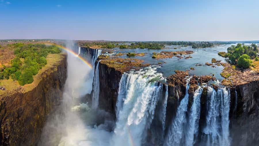 Victoria Falls Town: Victoria Falls Guided Sunrise Tour - Rainbow photos come with a chance of getting soaked