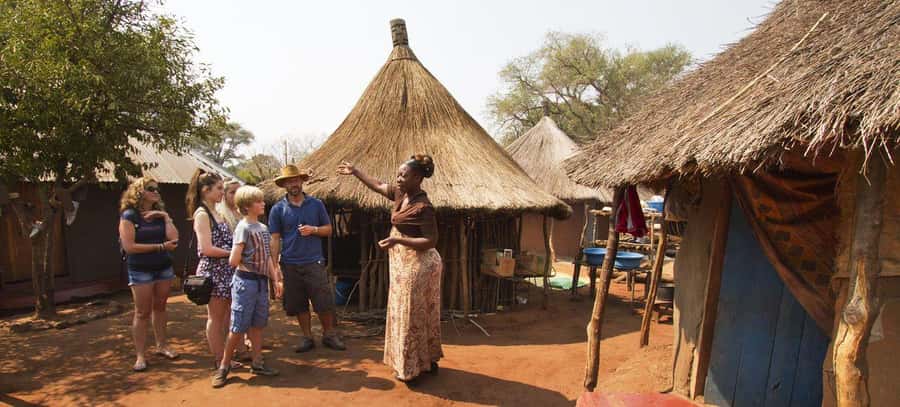 Victoria Falls: Village Tour with Traditional Food Tasting - What the family visit can feel like